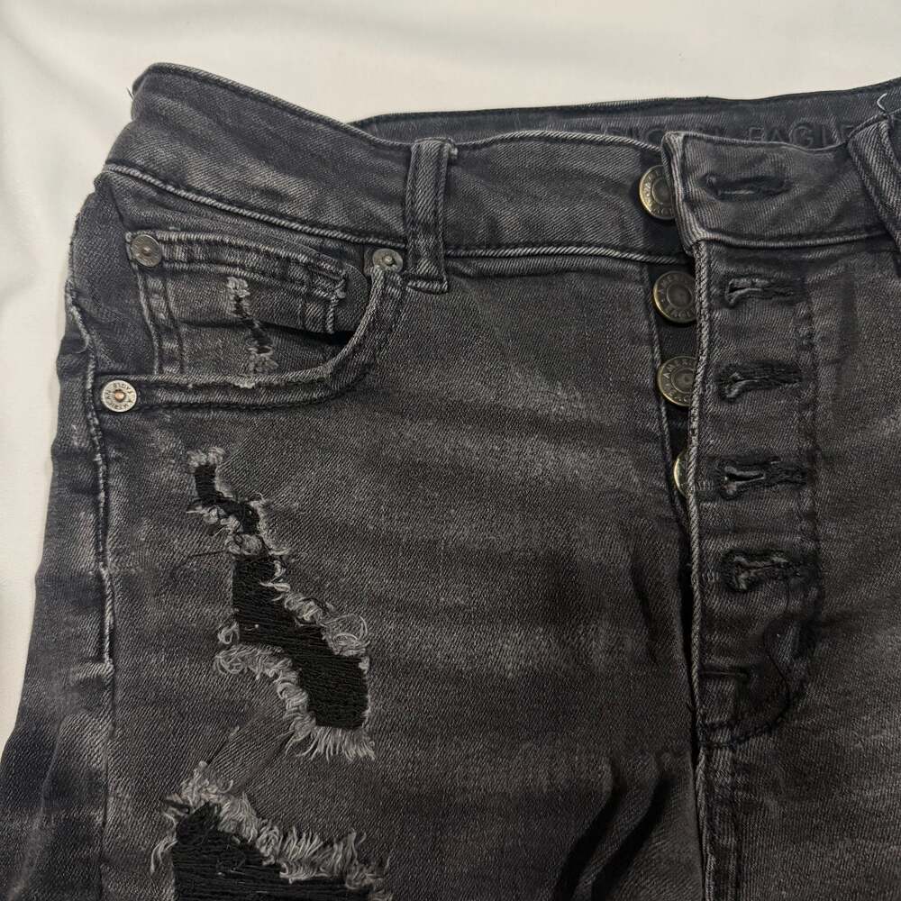 American Eagle Super Hi-Rise Next Level Stretch Black Distressed Button-Fly Shor - Picture 3 of 7